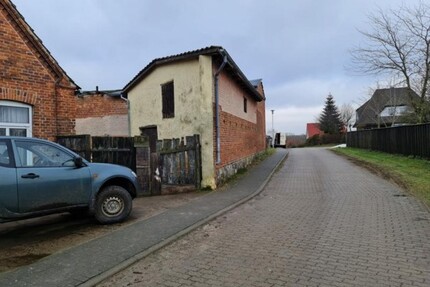 Baugrundstück mit einem alten Wohnhaus