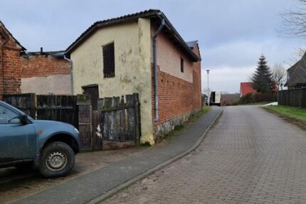 Baugrundstück mit einem alten Wohnhaus